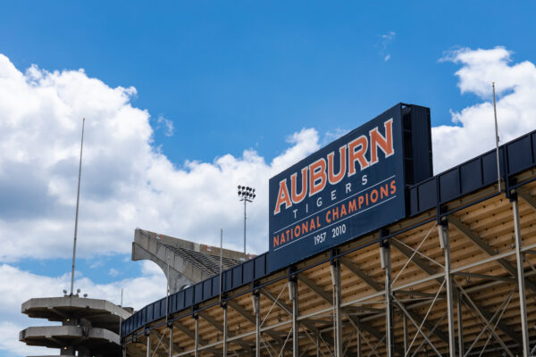 AUBURN ALABAMA, USA - JUNE 18, 2020 - Exterior of the Auburn University Jordan-Hare Stadium for football featuring the blue and orange Auburn Tigers National Champions sign